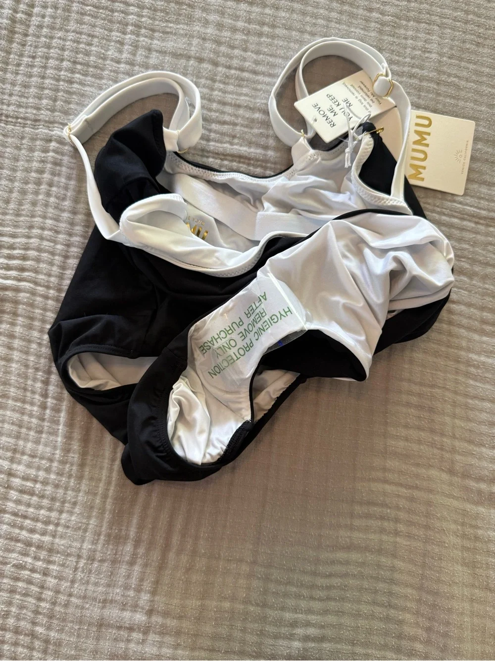 Show me your mumu black ”overseas” one piece brand new with tags